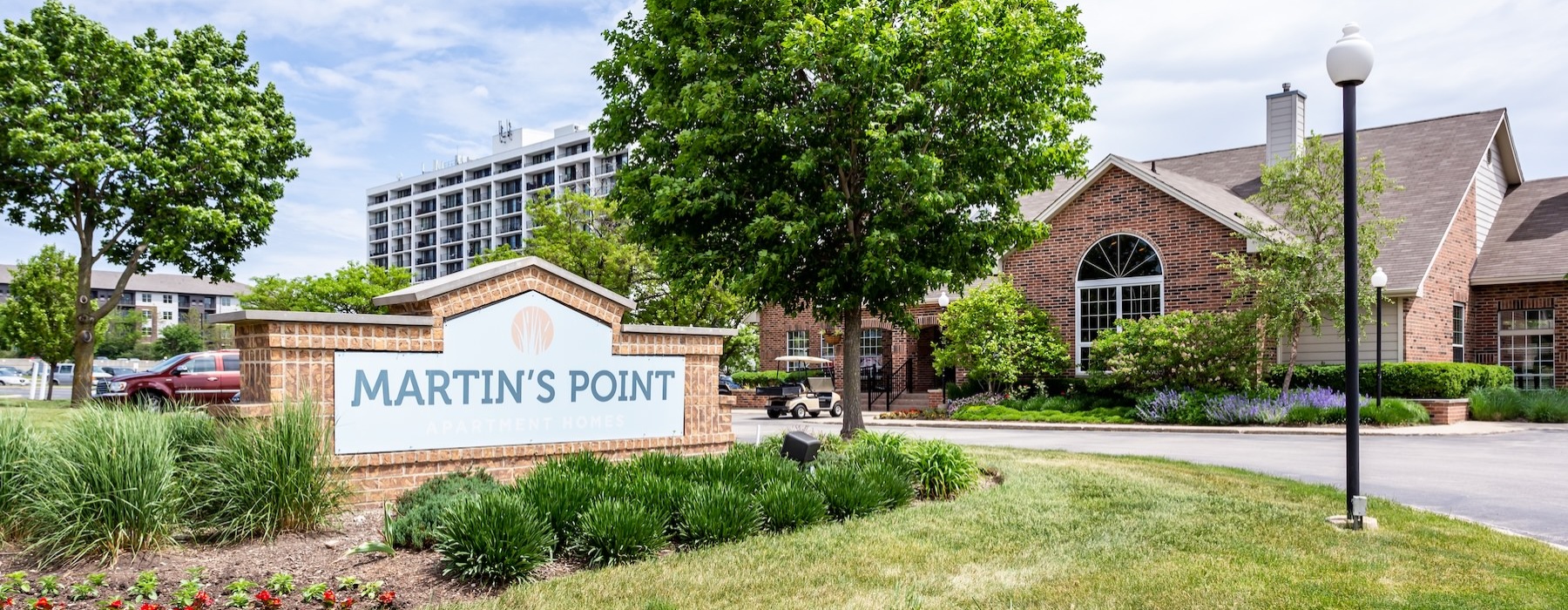 a sign in front of a building