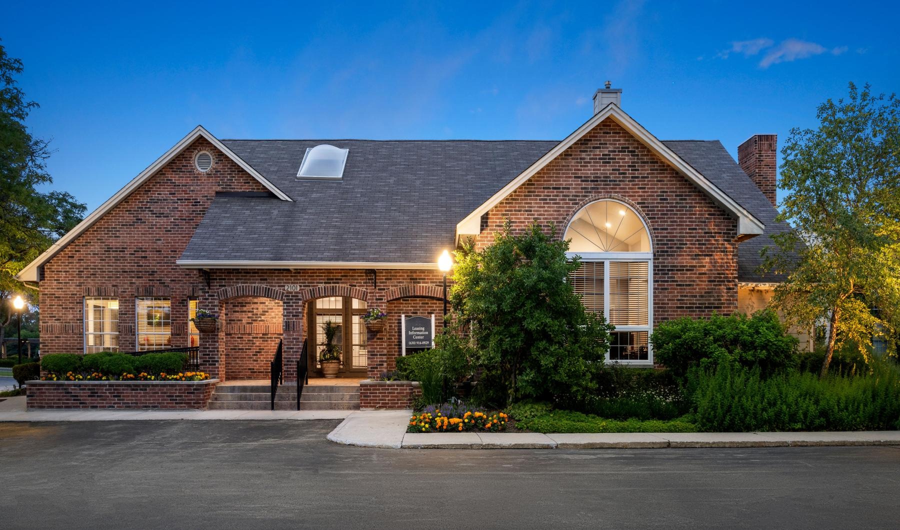a brick building with a driveway